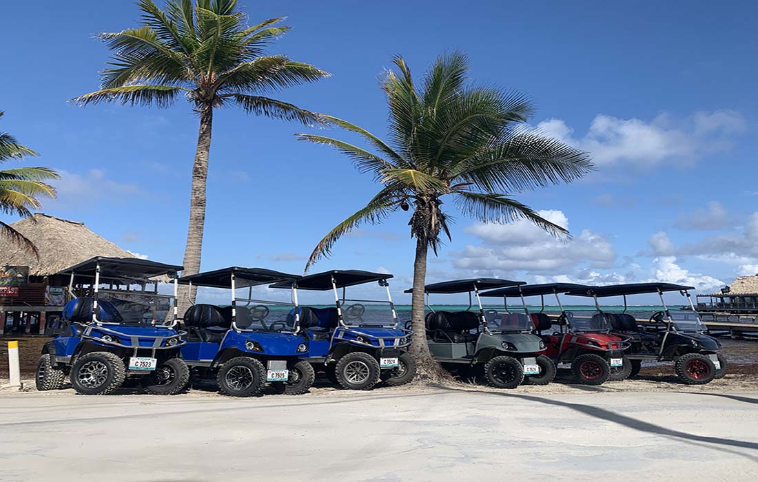 Golf cart on the beach in San Pedro Belize